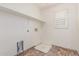 Laundry room featuring tile flooring, hookups, and a window at 3883 E Santa Fe Ln, Gilbert, AZ 85297