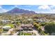 Expansive aerial view showcasing the property's size and mountain views at 4245 E Claremont Ave, Paradise Valley, AZ 85253