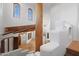 Interior architectural shot of a home, with wooden beams and multiple window views at 4245 E Claremont Ave, Paradise Valley, AZ 85253