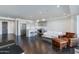 Bright and open living room with dark wood floors, a modern kitchen, and designer furniture at 4422 N 75Th St # 3012, Scottsdale, AZ 85251