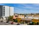 Street view of a building with visible signage, landscaping, and clear blue sky at 4422 N 75Th St # 3012, Scottsdale, AZ 85251