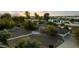 Aerial view of single-story home with landscaped yard and large driveway at 4450 N 54Th St, Phoenix, AZ 85018