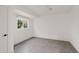 Simple bedroom with grey tile floor and large window at 4450 N 54Th St, Phoenix, AZ 85018