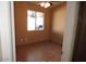 Bedroom with tile flooring and a window with blinds at 510 E Wickieup Ln, Phoenix, AZ 85024