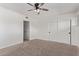 Spacious bedroom with double door closet and neutral wall colors at 530 N Miller St, Mesa, AZ 85203