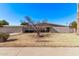 Midcentury home with spacious yard and mature tree at 530 N Miller St, Mesa, AZ 85203