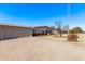 Ranch home with attached two-car garage and long driveway at 530 N Miller St, Mesa, AZ 85203