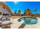 Relaxing pool area with diving board and patio furniture at 530 N Miller St, Mesa, AZ 85203