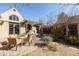 Backyard with dining table and outdoor seating area, complete with mature landscaping at 537 W Encanto Blvd, Phoenix, AZ 85003