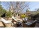 Serene backyard with a fire pit surrounded by comfortable seating, perfect for enjoying the outdoors at 537 W Encanto Blvd, Phoenix, AZ 85003