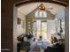 Open living room with french doors leading to an outdoor patio at 537 W Encanto Blvd, Phoenix, AZ 85003