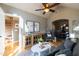 Open living room featuring hardwood floors and vaulted ceilings at 537 W Encanto Blvd, Phoenix, AZ 85003