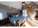 Bright main bedroom with hardwood floors and a lofted area at 537 W Encanto Blvd, Phoenix, AZ 85003