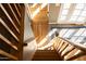 Bright staircase with hardwood floors leading to a sunny entrance and natural light at 537 W Encanto Blvd, Phoenix, AZ 85003