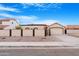 Desert home features a tile roof, a two car garage and gated, private front courtyard at 5421 W Brown St, Glendale, AZ 85302