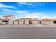 Desert home features a tile roof, a two car garage and gated, private front courtyard at 5421 W Brown St, Glendale, AZ 85302