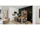 Modern dining room with wooden table and black accent wall at 5469 E Rock Bush Ln, San Tan Valley, AZ 85140