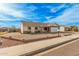 Charming single-story home showcasing low maintenance desert landscaping and a brick-accented facade at 5603 W Bluefield Ave, Glendale, AZ 85308