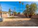 Backyard view of house with mature trees at 6201 W Maryland Ave, Glendale, AZ 85301