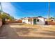 View of house from backyard, showing solar panels at 6201 W Maryland Ave, Glendale, AZ 85301