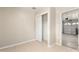 Interior view of garage entry with sliding closet at 6201 W Maryland Ave, Glendale, AZ 85301