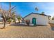 Front view of charming house with teal door at 6201 W Maryland Ave, Glendale, AZ 85301