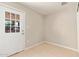 Bright laundry room with tile floors and exterior access at 6201 W Maryland Ave, Glendale, AZ 85301