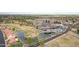 Aerial view of community clubhouse, pool, and golf course at 6871 S Coral Gable Dr, Chandler, AZ 85249