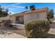 Home's backyard with covered patio and desert landscaping at 6871 S Coral Gable Dr, Chandler, AZ 85249