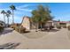 Home's backyard with patio furniture and desert landscaping at 6871 S Coral Gable Dr, Chandler, AZ 85249