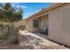 Home's backyard with covered patio and desert landscaping at 6871 S Coral Gable Dr, Chandler, AZ 85249