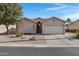 Single-story home with a two-car garage and desert landscaping at 6871 S Coral Gable Dr, Chandler, AZ 85249