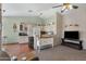 Kitchen with light-colored cabinets and a breakfast bar at 6871 S Coral Gable Dr, Chandler, AZ 85249