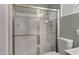 Shower stall with glass enclosure and handheld shower head at 6871 S Coral Gable Dr, Chandler, AZ 85249