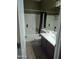 Clean bathroom with a tub, shower, and vanity at 7417 W Park St, Laveen, AZ 85339