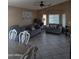 Spacious living room with neutral colored furniture and large windows at 7417 W Park St, Laveen, AZ 85339