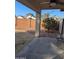 Covered patio with a small table and chairs at 7417 W Park St, Laveen, AZ 85339