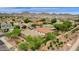 Aerial view showcasing a house with a backyard and surrounding neighborhood at 7635 W Rock Springs Dr, Peoria, AZ 85383