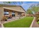 Home exterior showcasing a spacious backyard and patio at 7635 W Rock Springs Dr, Peoria, AZ 85383