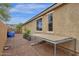 Side yard with a dog kennel and additional space at 7635 W Rock Springs Dr, Peoria, AZ 85383