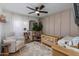 Charming Bedroom with soft textures, whimsical decor, and ample natural light at 8024 E Hubbell St, Scottsdale, AZ 85257