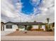 Charming single-story home boasts a well-maintained yard with desert landscaping and a freshly painted exterior at 8024 E Hubbell St, Scottsdale, AZ 85257