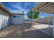 Backyard view with gravel landscaping and covered patio at 8413 E Sheridan St, Scottsdale, AZ 85257