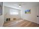 Light and airy bedroom featuring wood-look floors at 8413 E Sheridan St, Scottsdale, AZ 85257