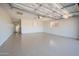 Clean and spacious garage with epoxy flooring and ample storage at 8413 E Sheridan St, Scottsdale, AZ 85257