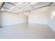 Clean and spacious garage with epoxy flooring and ample storage at 8413 E Sheridan St, Scottsdale, AZ 85257