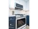 Stainless steel Samsung range and microwave in a stylish kitchen at 8413 E Sheridan St, Scottsdale, AZ 85257