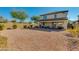 Large gravel backyard with a covered patio and low-maintenance landscaping at 852 E Gary Ln, Phoenix, AZ 85042