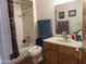 Bathroom with shower/tub combo, vanity, and toilet at 921 S Pioneer --, Mesa, AZ 85204