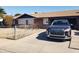 Ranch style home with attached garage and front yard at 921 S Pioneer --, Mesa, AZ 85204